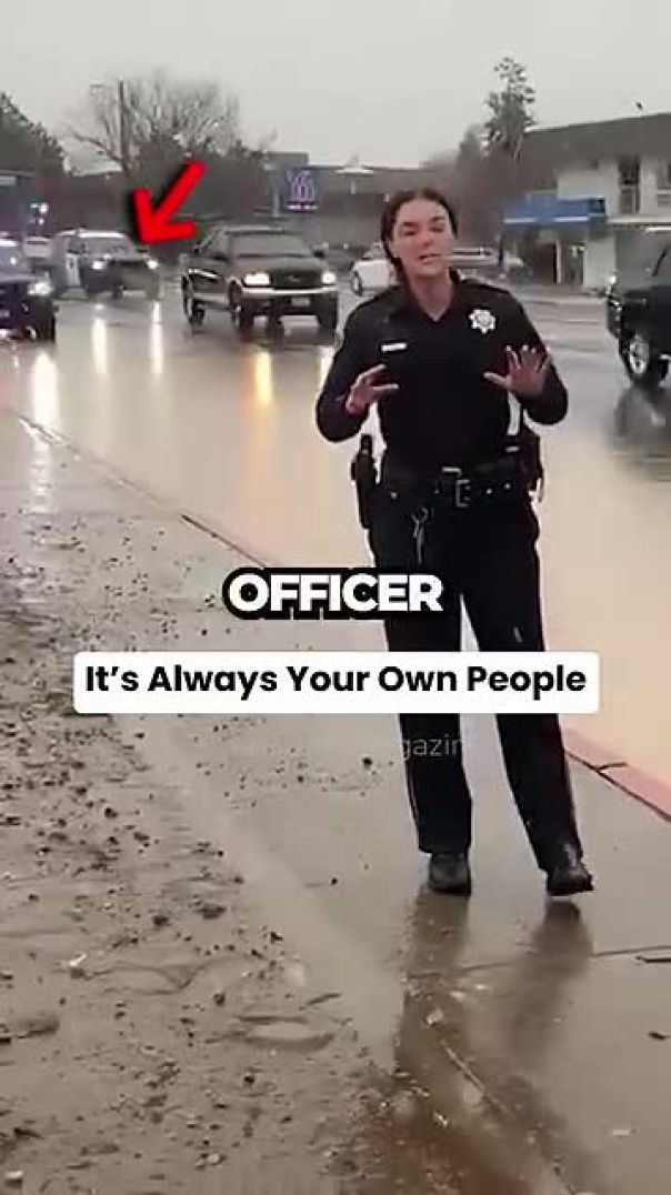 Officer gets splashed with cold water